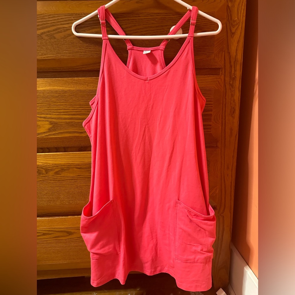 Bright pink romper with built in shorts.